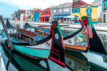 Aveiro, Portugal - Nov. 2019: Traditional boats on the water channel in the town of Aveiro. Colorful boats for tourists pleasureのeditorial素材