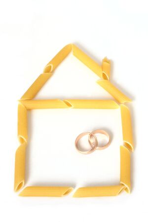 Pasta home sign with wedding ringsの写真素材