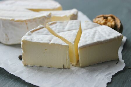 Camembert cheese. Farm products, rustic cheese. Copy space