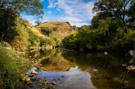 Tizatirla river reflecting the treesの写真素材
