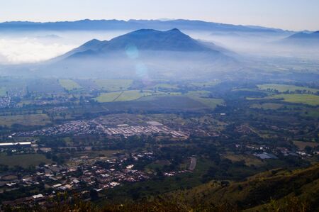 Mist wrapping the Mountsの写真素材