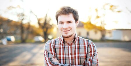 portrait of a young man outdoors の写真素材