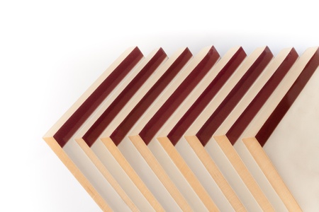 A stack of paperback books arranged in a directional pattern の写真素材