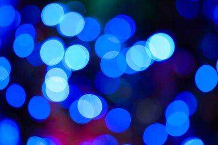 Christmas lights blue bokeh の写真素材