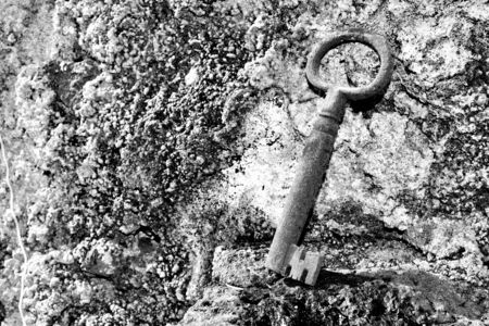 very old door key in rusty ironの写真素材