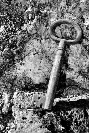 very old door key in rusty ironの写真素材