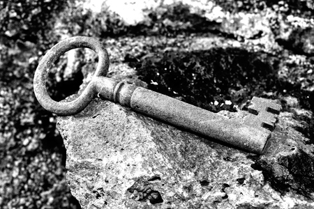 very old door key in rusty ironの写真素材