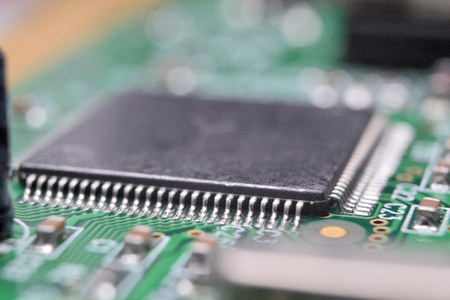 close up of electronic components on pcb board
