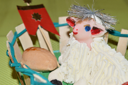 close up of marzipan Easter lamb and fruit in a basketの写真素材