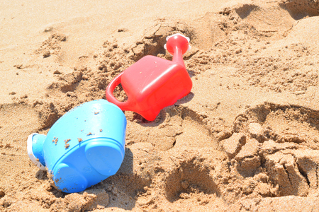 building a sand castle on the beachの写真素材