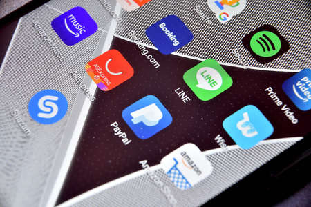 Valverde (CT), Italy - April 12, 2020: Close-up view of Line icon app on an Android smartphone, including other icons.のeditorial素材