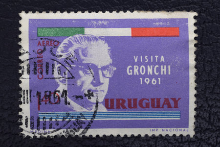 Valverde (CT), Italy - January 15, 2023: an old postage stamp from Uruguay showing the Italian president Gronchi printed on the occasion of his visit in 1961のeditorial素材