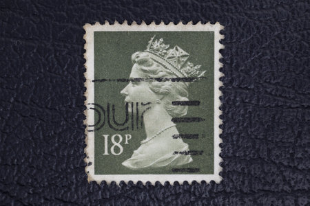 Valverde (CT), Italy - January 15, 2023: an old postage stamp from Great Britain showing Queen Elizabeth IIのeditorial素材