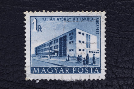 Valverde (CT), Italy - January 15, 2023: An old postage stamp from Hungary showing Public buildingのeditorial素材