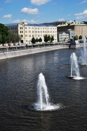 View of the fountains on the bypass canal. Embankment and old houses. Moscow, Russia, May 22, 2021のeditorial素材