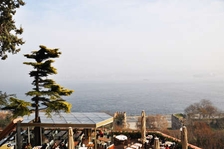 Fog over the Bosphorus. View of the cafe and the strait. 05 January 2014 Istanbul, Turkey.のeditorial素材