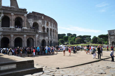 Tourists in front of the Colosseum in Rome. June 13, 2019. Rome. Italy.