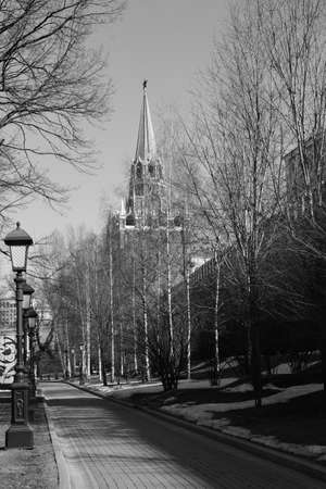 black and white photography. Alexander Garden, view of the Nikolskaya tower of the Moscow Kremlin. early spring.の写真素材
