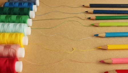 Color treads with pencilsの写真素材