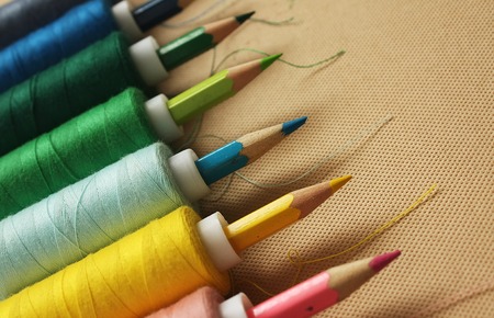 Color treads with pencilsの写真素材