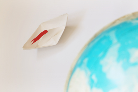 Travel concept with paper boatの写真素材