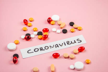 Covid-19, medical instruments, syringe and colorful medicines