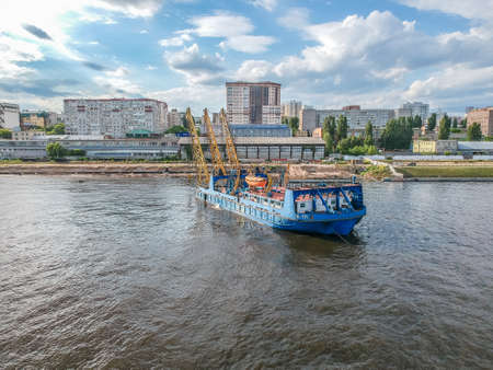The crane ship carries out the rise of the sunken vessel from the bottomの写真素材
