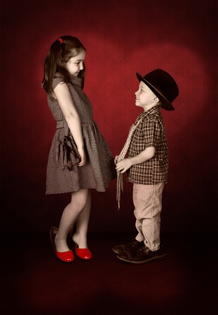 Nostalgia image of young lady and little gentleman confession in loveの写真素材