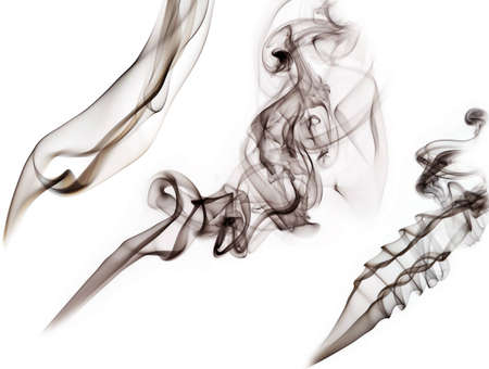 Three different shapes of smoke on a white backgroundの写真素材