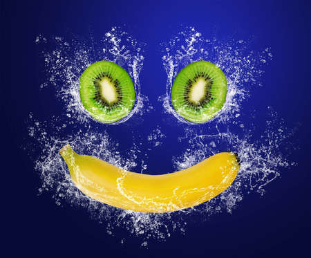 Abstract smile with tropical fruits in water splashesの写真素材