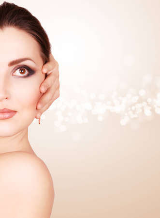 Half face beautiful woman with fashion makeupの写真素材