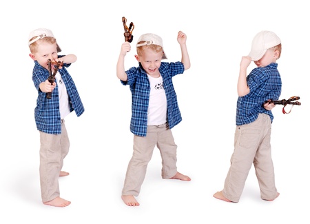 Three images of expressive emotional  little madcap boy  with slingshootの写真素材