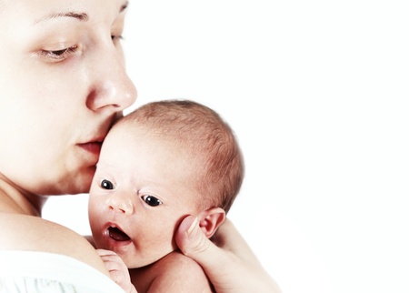 Mother portrait with her newborn daughter in handsの写真素材