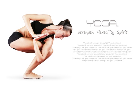Yoga background.Girl in twisted chair yoga positionの写真素材
