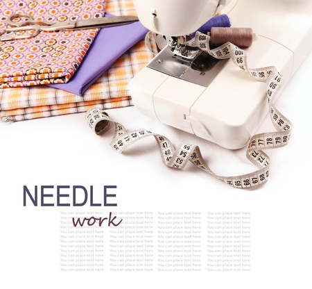 Needle work hobby background with sewing machine and toolsの写真素材