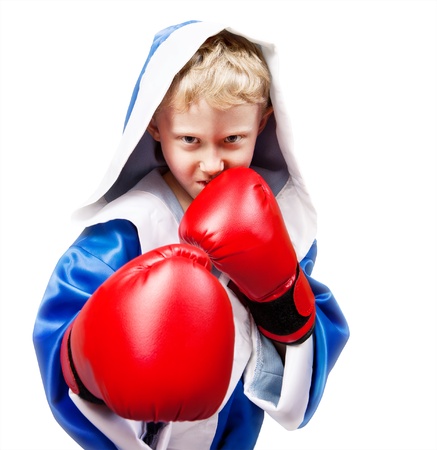 Boxing boy in red gloves on white backgroundの写真素材