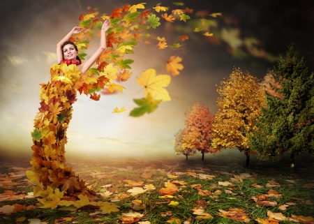 Abstract autumn image. Lady Autumn with leaves wingsの写真素材