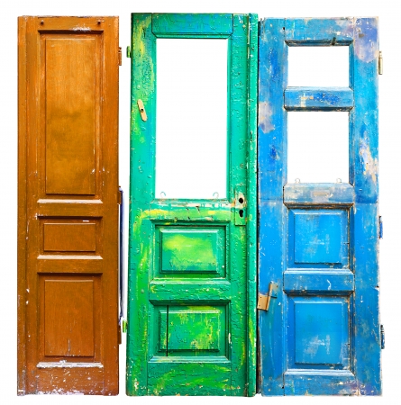 Three colored old wooden doors backgroundの写真素材