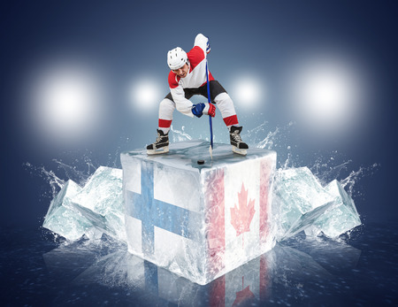 Finland - Canada game  Face-off player on the ice cube の写真素材