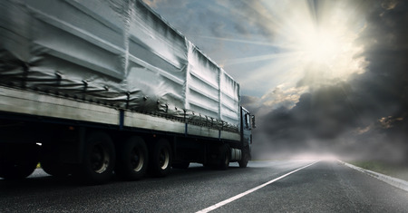 Big tented truck on the lonely highwayの写真素材