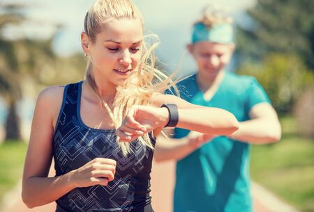 Young couple finishing goggingの写真素材