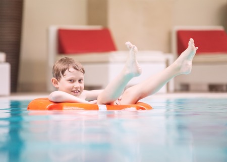 Swiming boy in poolの写真素材