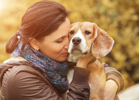 Woman and her favorite dog portraitの写真素材