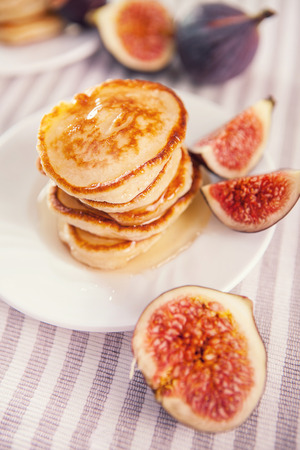 Pancakes with honey and figsの写真素材