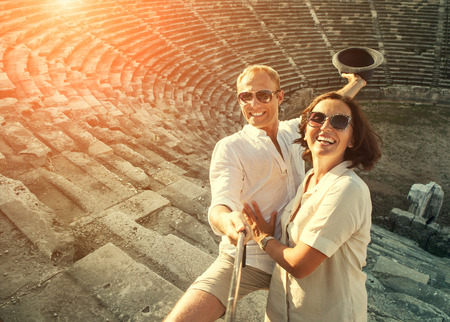 Happy young couple take self photo in their vacationの写真素材
