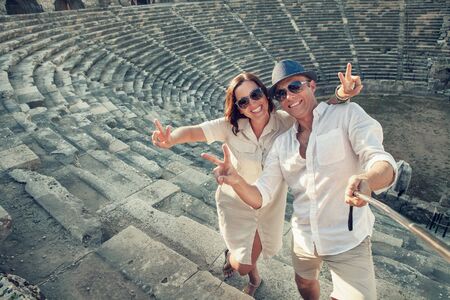 Positive young couple take a self photoの写真素材