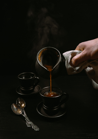 Turkish coffee pouring momentの写真素材