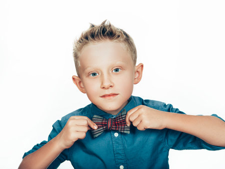 Boy with bow tie portraitの写真素材