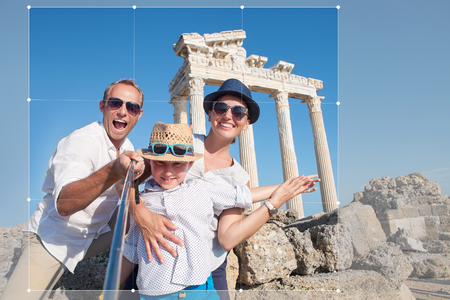 Happy family take selfie photo on summer vacationの写真素材