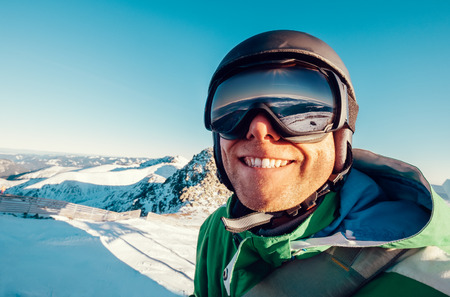 Skier man portrait in safe ski equipmentの写真素材